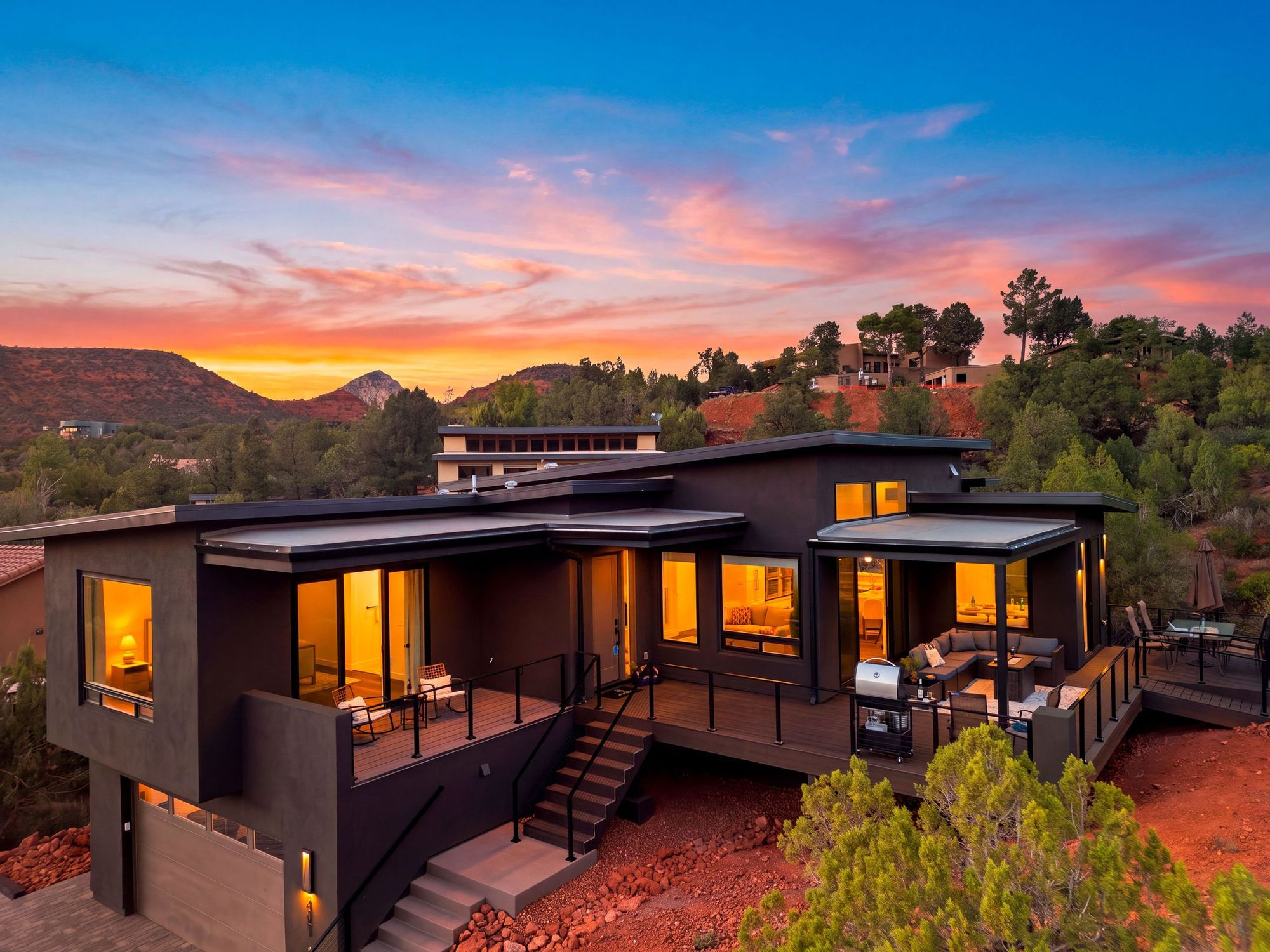 The house at sunset, seen from above.